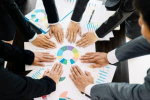 business team Analysis graph to discuss company financial statistics, brainstorm ideas, Teamwork Business Meeting Concept.